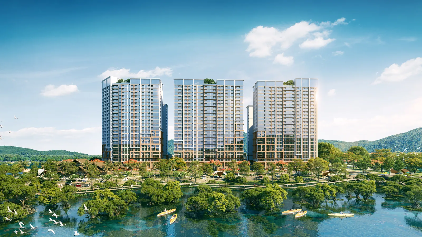 Cụm ba tháp The Onsen Charmora City nhìn từ phía sông